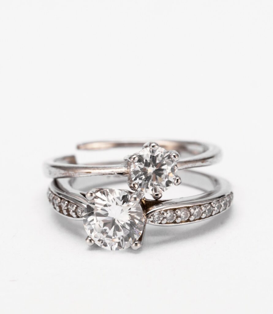 Closeup of diamond rings on a white background