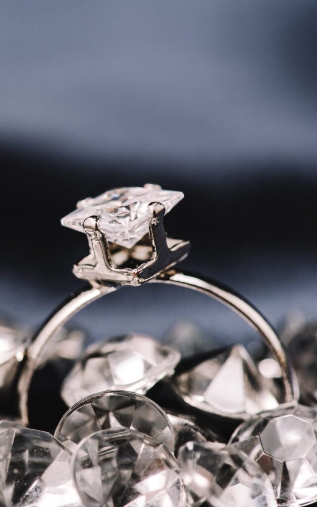 selective focus of engagement ring with pure shiny diamond